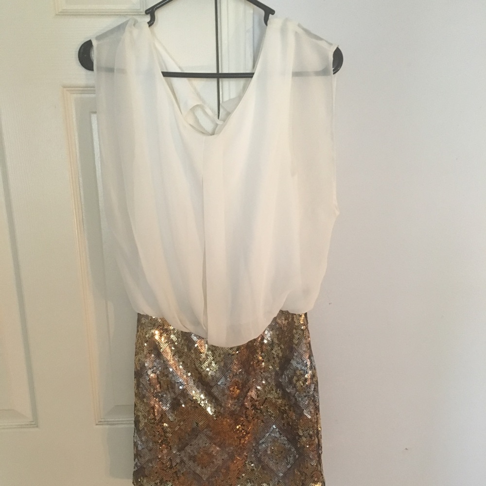 White and gold sequined dress